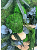 Tableau rond végétal avec feuillages verts et écorce de bois